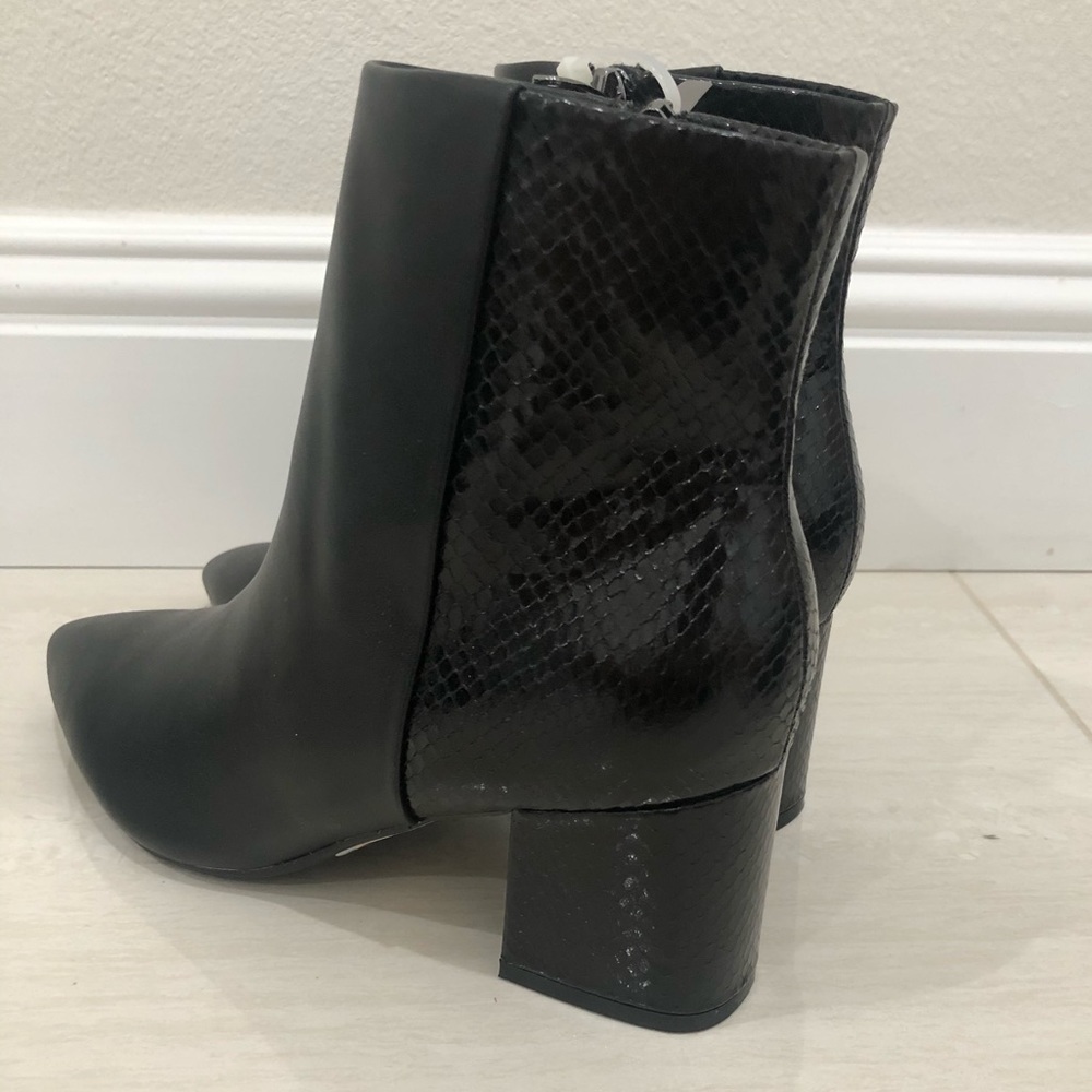 Black leather boots w/patent leather snake heel